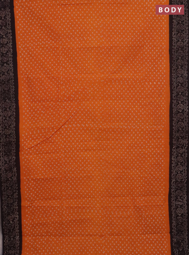 Sungudi cotton saree dark mustard and coffee brown with allover butta prints and paisley printed border