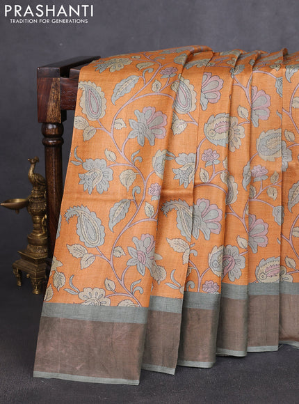 Pure tussar silk saree orange and pastel green with allover prints and zari woven border