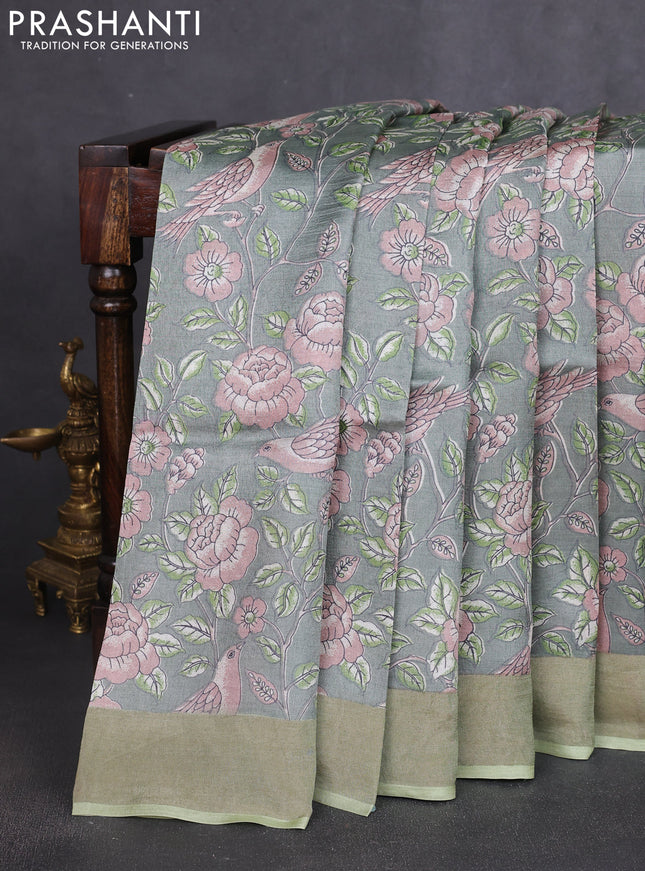 Pure tussar silk saree green with allover prints and zari woven border