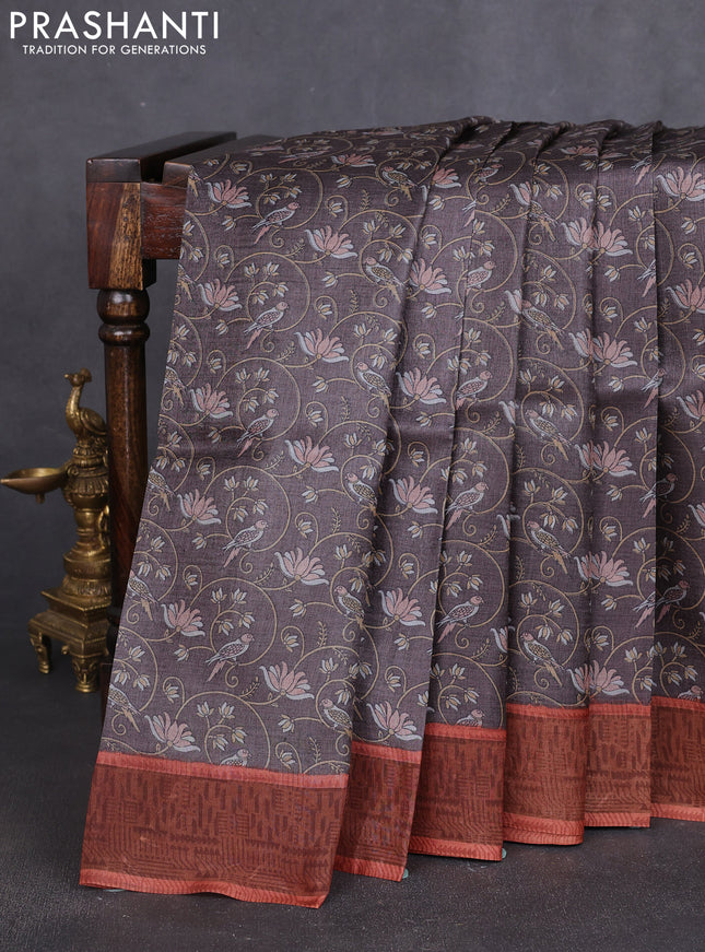 Pure tussar silk saree grey and rust shade with allover prints and zari woven border
