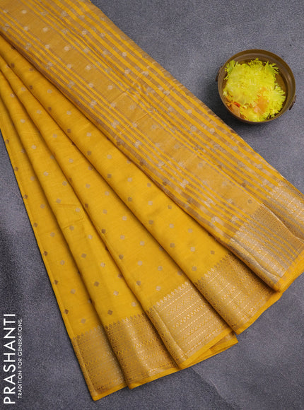 Semi raw silk saree yellow with allover zari woven 1000 buttas and zari woven border