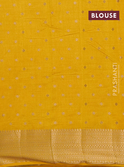 Semi raw silk saree yellow with allover zari woven 1000 buttas and zari woven border