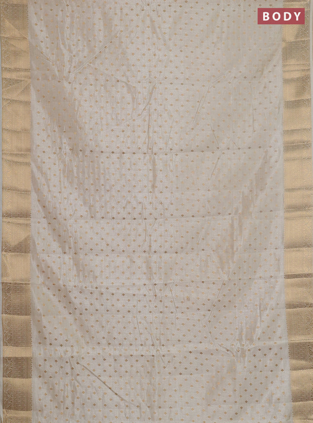 Semi raw silk saree cream with allover zari woven 1000 buttas and zari woven border