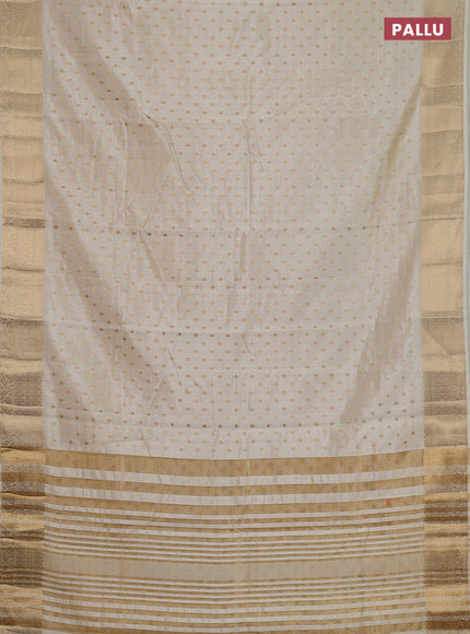 Semi raw silk saree cream with allover zari woven 1000 buttas and zari woven border