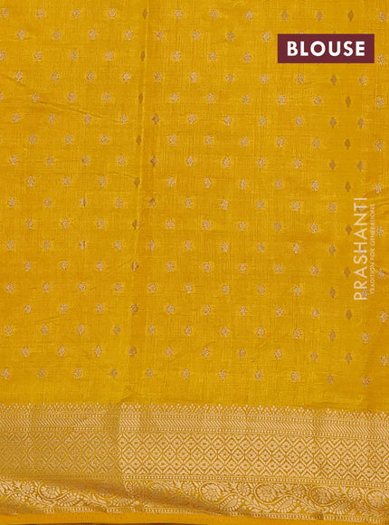 Semi raw silk saree yellow with allover zari woven 1000 buttas and zari woven border