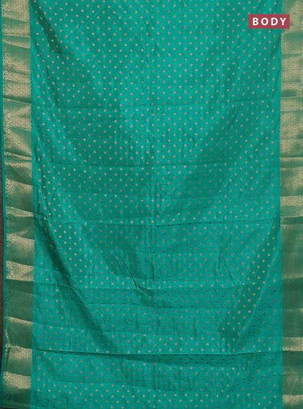 Semi raw silk saree teal green with allover zari woven 1000 buttas and zari woven border