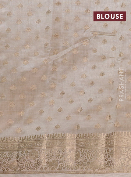 Semi raw silk saree cream with allover zari woven 1000 buttas and zari woven border
