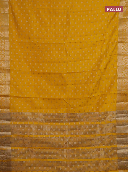 Semi raw silk saree yellow with allover zari woven 1000 buttas and zari woven border