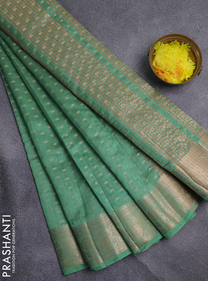 Semi raw silk saree pastel green with allover zari woven 1000 buttas and zari woven border
