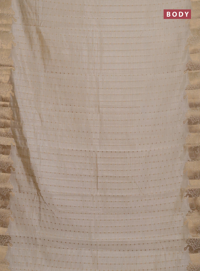 Semi raw silk saree cream with allover zari woven 1000 buttas and zari woven border