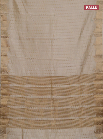 Semi raw silk saree cream with allover zari woven 1000 buttas and zari woven border