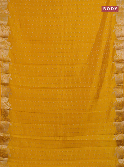 Semi raw silk saree yellow with allover zari woven 1000 buttas and zari woven border