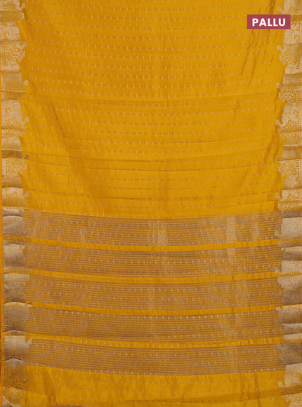 Semi raw silk saree yellow with allover zari woven 1000 buttas and zari woven border