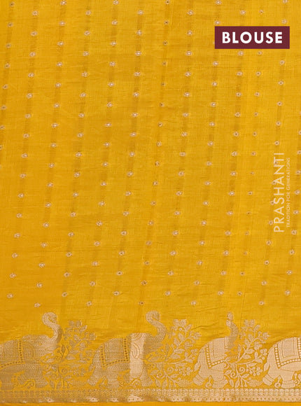 Semi raw silk saree yellow with allover zari woven 1000 buttas and zari woven border