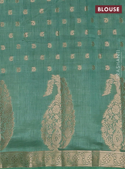 Semi raw silk saree pastel green with allover zari woven 1000 buttas and zari woven border