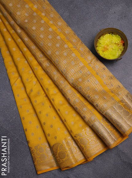Semi raw silk saree yellow with allover zari woven 1000 buttas and zari woven border