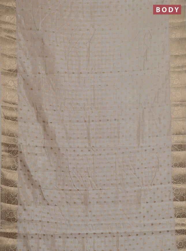 Semi raw silk saree cream with allover zari woven 1000 buttas and zari woven border