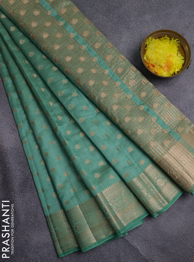 Semi raw silk saree pastel green with allover zari woven 1000 buttas and zari woven border