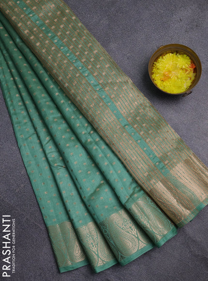 Semi raw silk saree pastel green with allover zari woven 1000 buttas and zari woven border