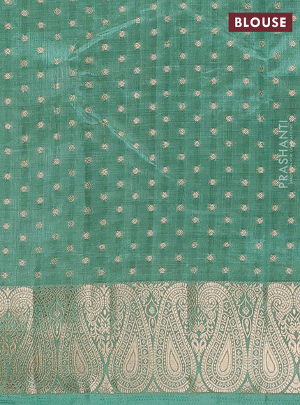 Semi raw silk saree pastel green with allover zari woven 1000 buttas and zari woven border