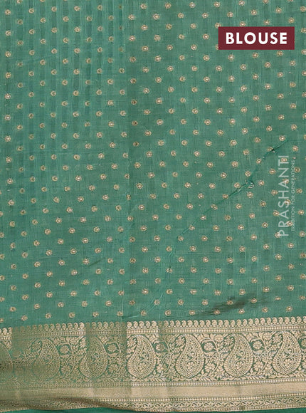 Semi raw silk saree light green with allover zari woven 1000 buttas and zari woven border