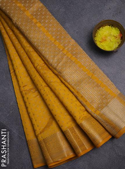 Semi raw silk saree yellow with allover zari woven 1000 buttas and zari woven border