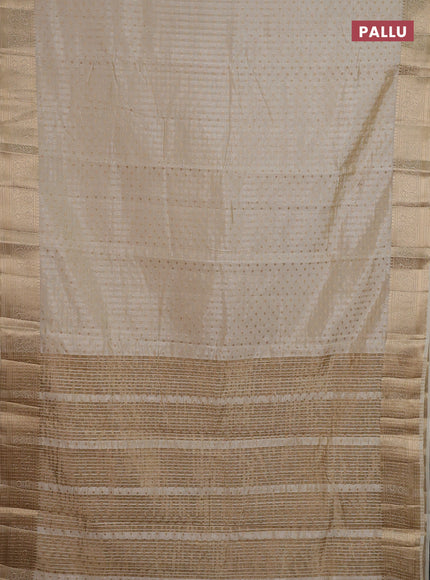 Semi raw silk saree cream with allover zari woven 1000 buttas and zari woven border