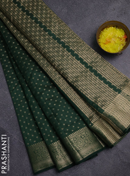 Semi raw silk saree bottle green with allover zari woven 1000 buttas and zari woven border