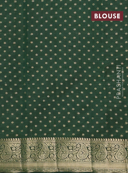 Semi raw silk saree bottle green with allover zari woven 1000 buttas and zari woven border