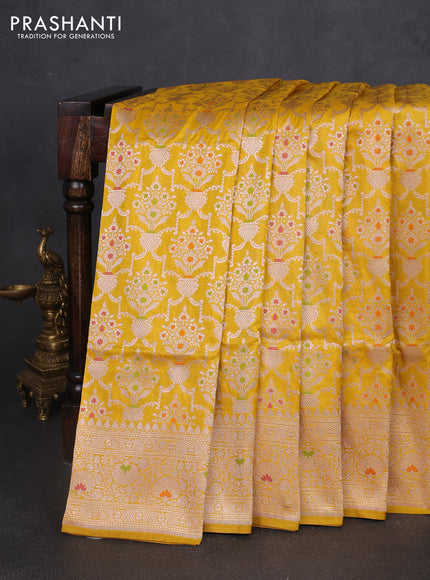 Banarasi uppada silk saree yellow with allover zari woven brocade weaves and floral zari woven border