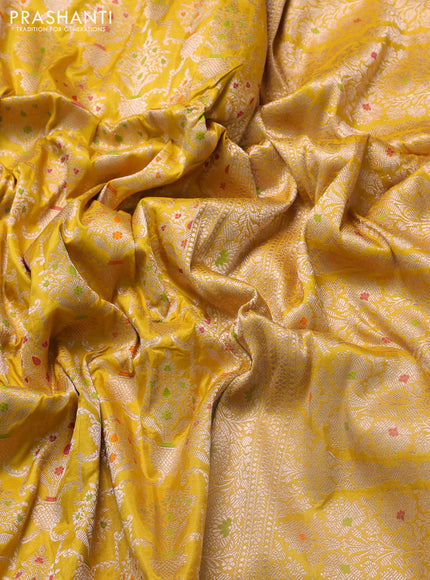 Banarasi uppada silk saree yellow with allover zari woven brocade weaves and floral zari woven border