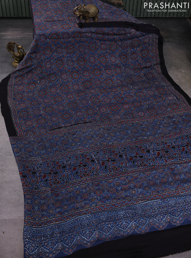 Modal silk saree blue and black with allover ajrakh prints and printed border
