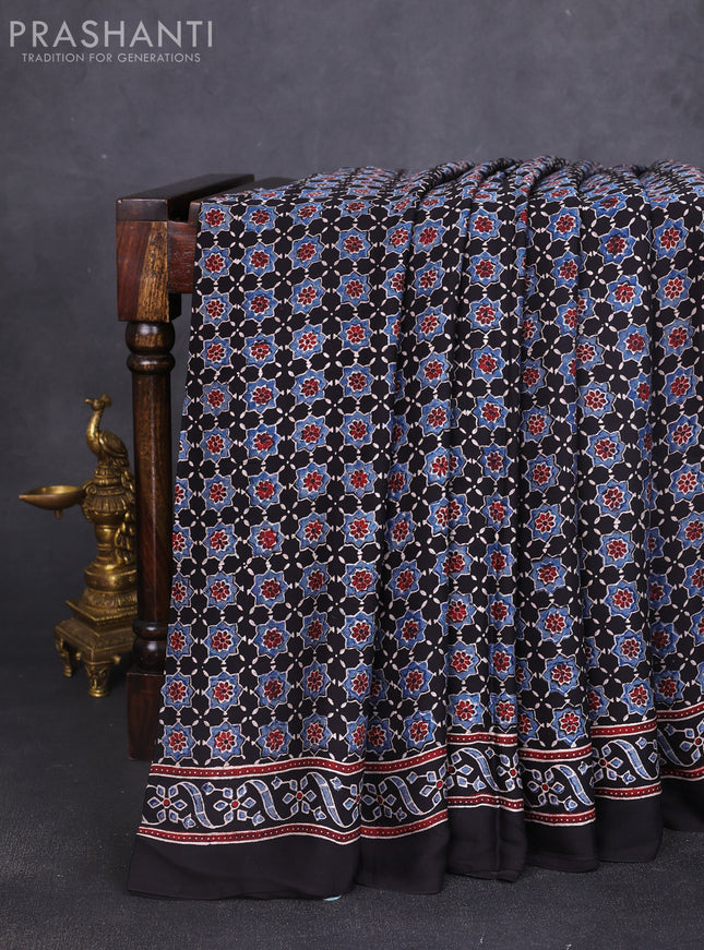 Modal silk saree black and blue with allover ajrakh prints and printed border