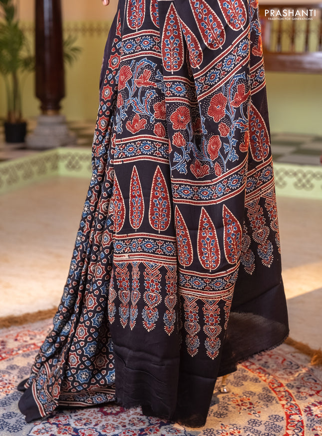 Modal silk saree black with allover ajrakh prints and printed border