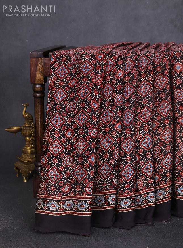 Modal silk saree black with allover ajrakh prints and printed border