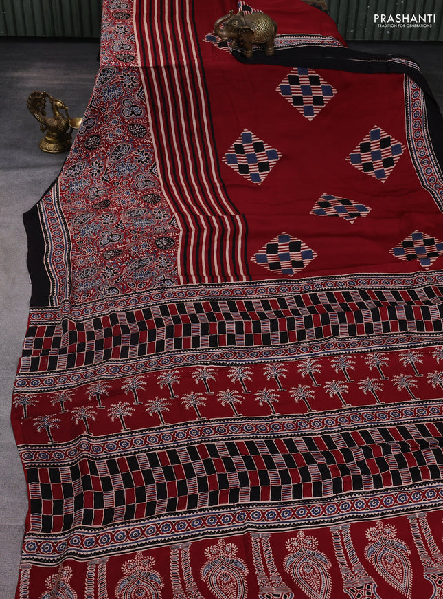Modal silk saree maroon and black with allover ajrakh butta prints and printed border