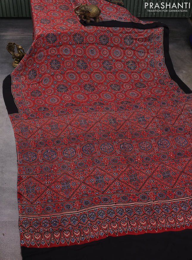 Modal silk saree rustic maroon and black with allover ajrakh prints and printed border