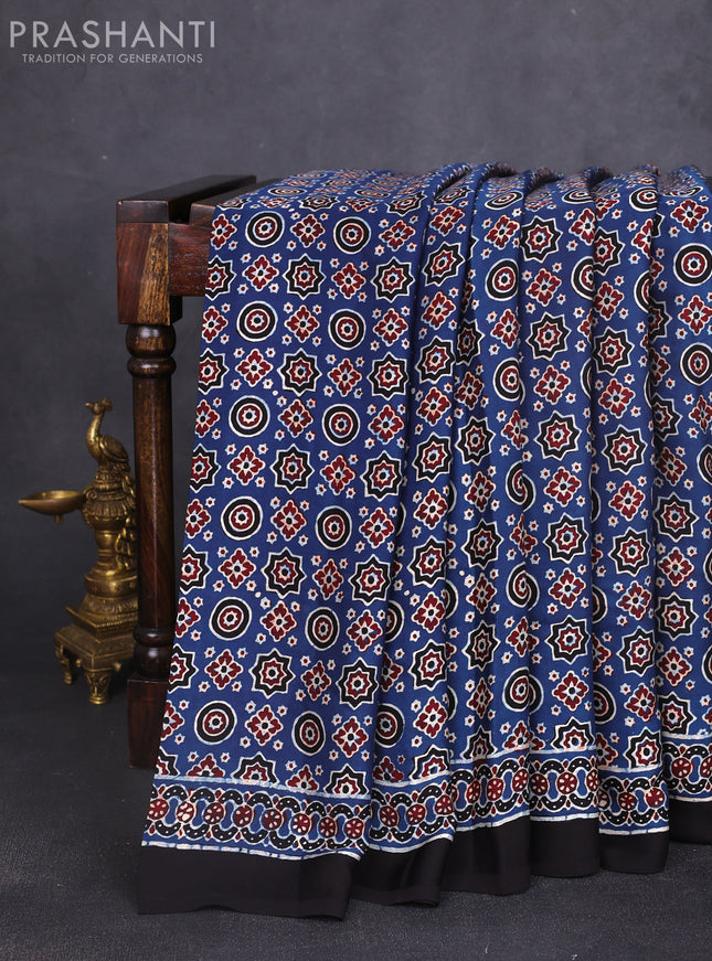 Modal silk saree indigo blue and black with allover ajrakh prints and long printed border