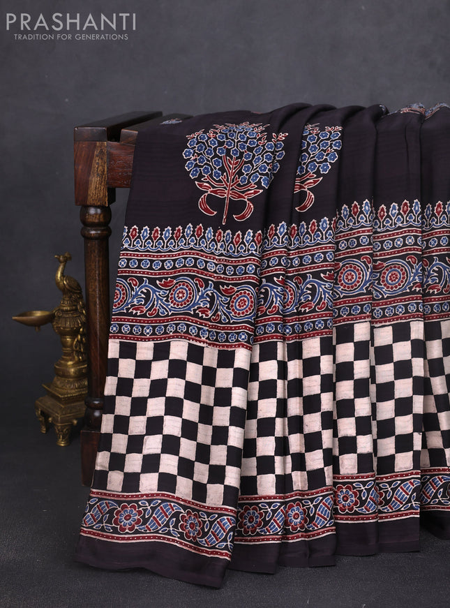 Modal silk saree black and cream with allover ajrakh butta prints and long printed border