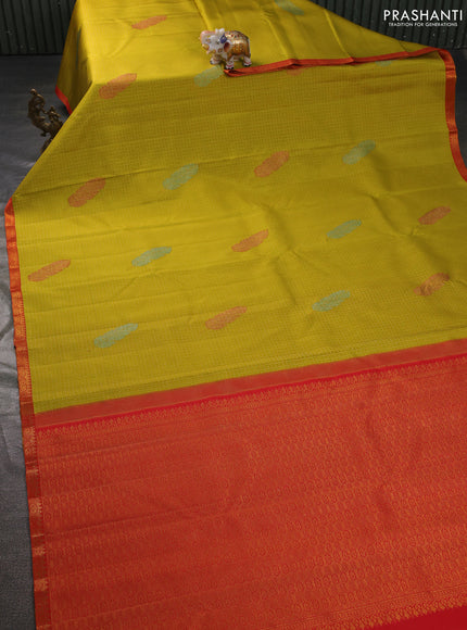 Pure kanchipuram silk saree lime yellow and orange with allover zari woven brocade weaves and zari woven border