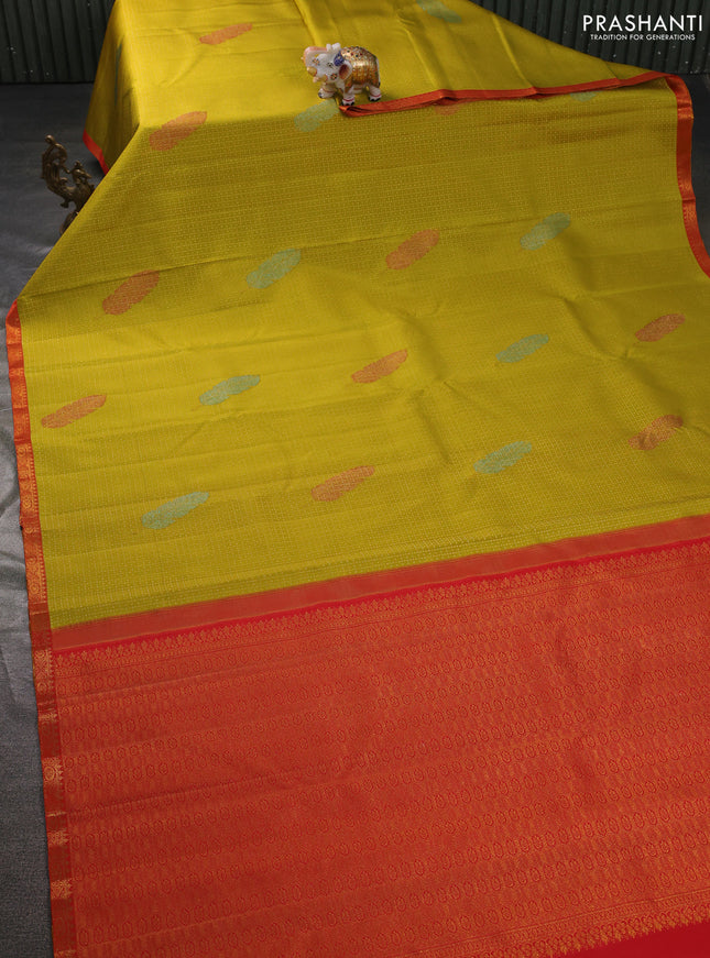 Pure kanchipuram silk saree lime yellow and orange with allover zari woven brocade weaves and zari woven border