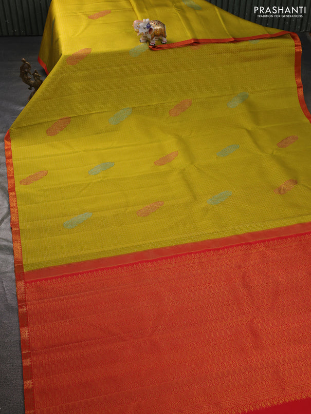 Pure kanchipuram silk saree lime yellow and orange with allover zari woven brocade weaves and zari woven border