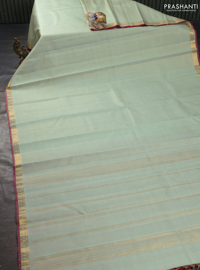 Pure kanchipuram silk saree pista green and maroon with allover vairosi pattern and zari woven border
