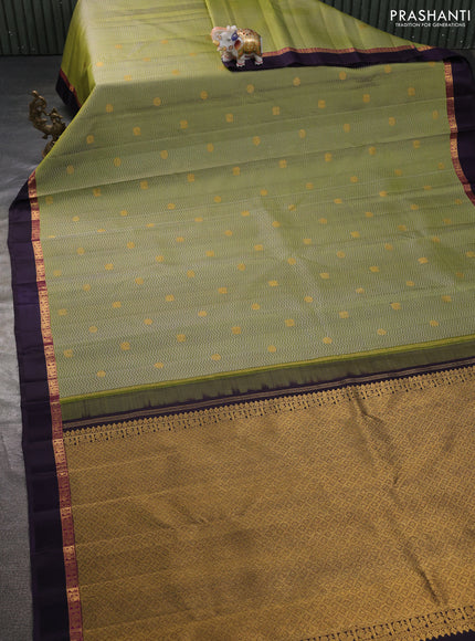 Pure kanchipuram silk saree mehendi green and jamun shade with allover self emboss & zari buttas and zari woven self emboss border