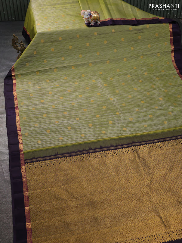 Pure kanchipuram silk saree mehendi green and jamun shade with allover self emboss & zari buttas and zari woven self emboss border