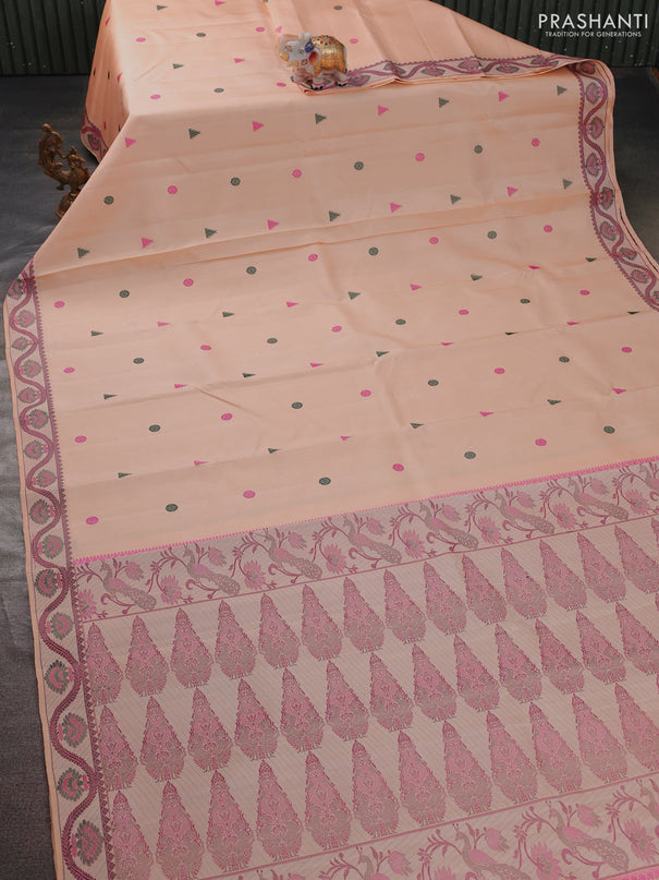 Pure kanchipuram silk saree pale orange with thread woven buttas and thread woven border