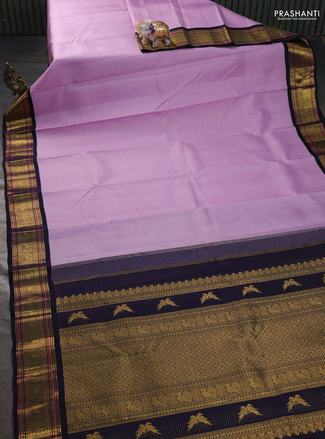 Pure kanchipuram silk saree mild lavender and navy blue with allover smalk zari woven checked pattern and zari woven korvai border