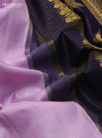 Pure kanchipuram silk saree mild lavender and navy blue with allover smalk zari woven checked pattern and zari woven korvai border
