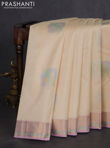 Pure kanchipuram silk saree cream and mild lavender with thread & zari woven floral buttas and rich zari woven border