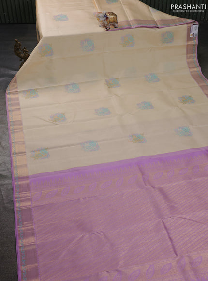 Pure kanchipuram silk saree cream and mild lavender with thread & zari woven floral buttas and rich zari woven border